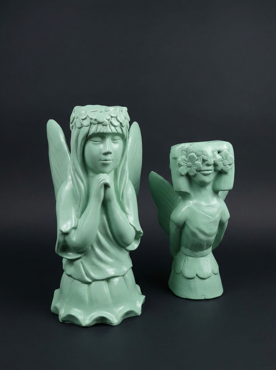 Mint Angel Planter Bust Pair — MD 1047