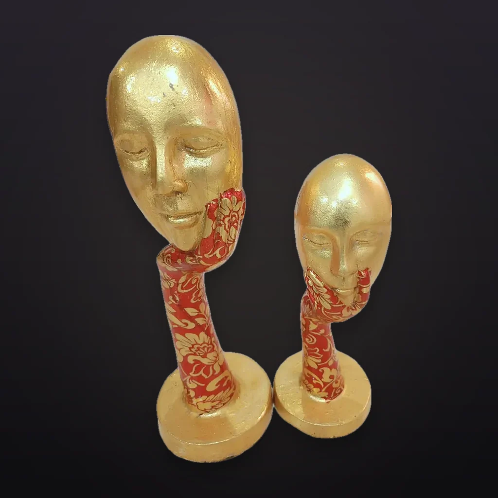 Golden Face Statue Pair on Stands
